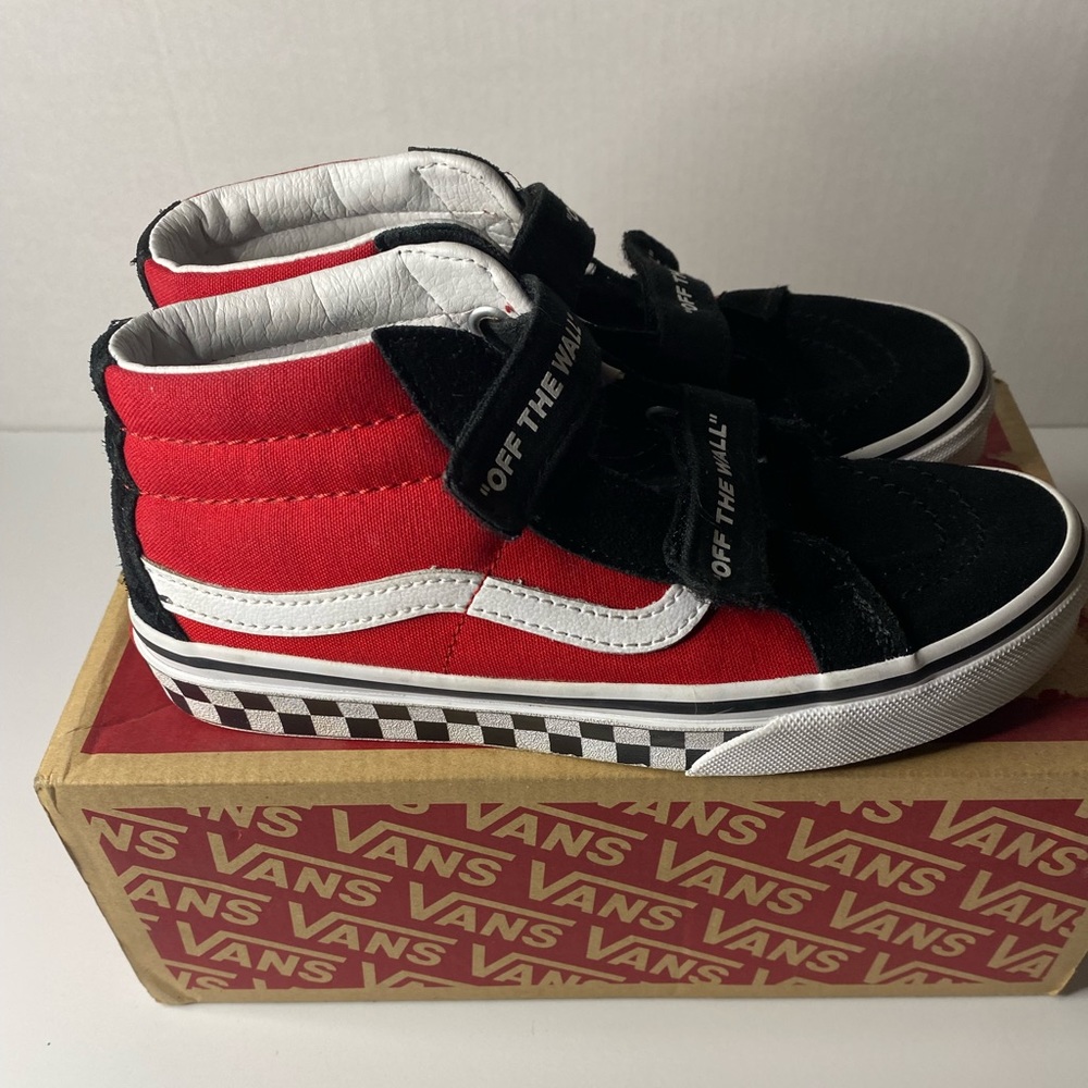 Boy’s Van sneakers red, black, and white in color size 3.0